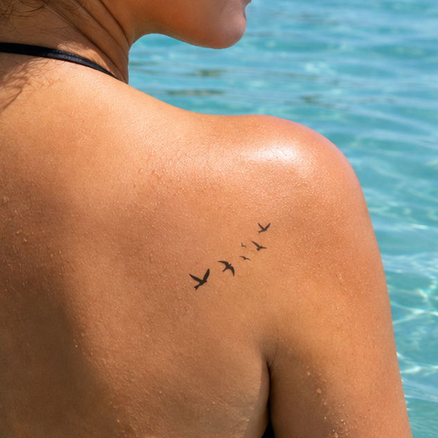 Temporäres Tattoo von minink: Sechs fliegende Vögel