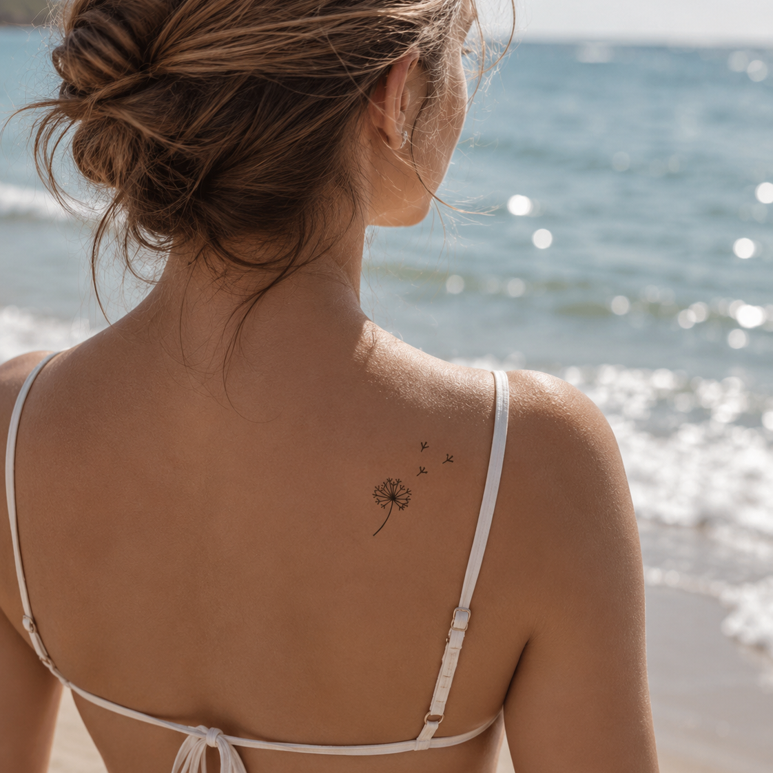 Löwenzahn mit Samen Tattoo von minink, der Marke für temporäre Tattoos.