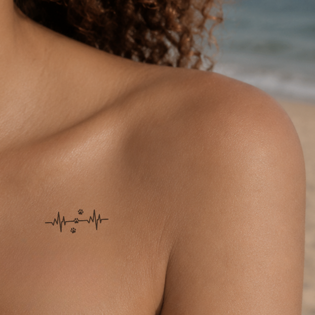 Herzschlag mit Pfoten Tattoo von minink, der Marke für temporäre Tattoos.