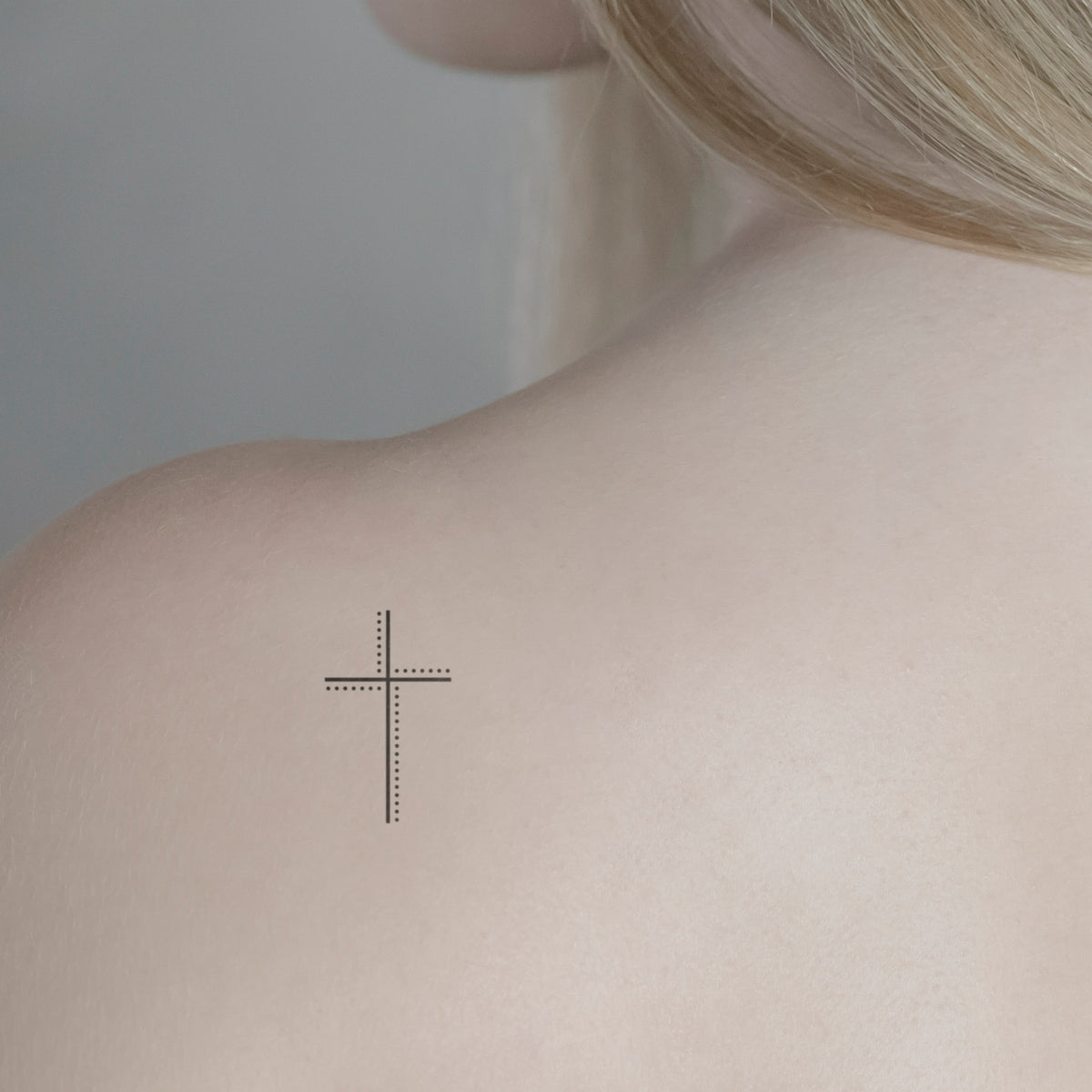 Cross with dots