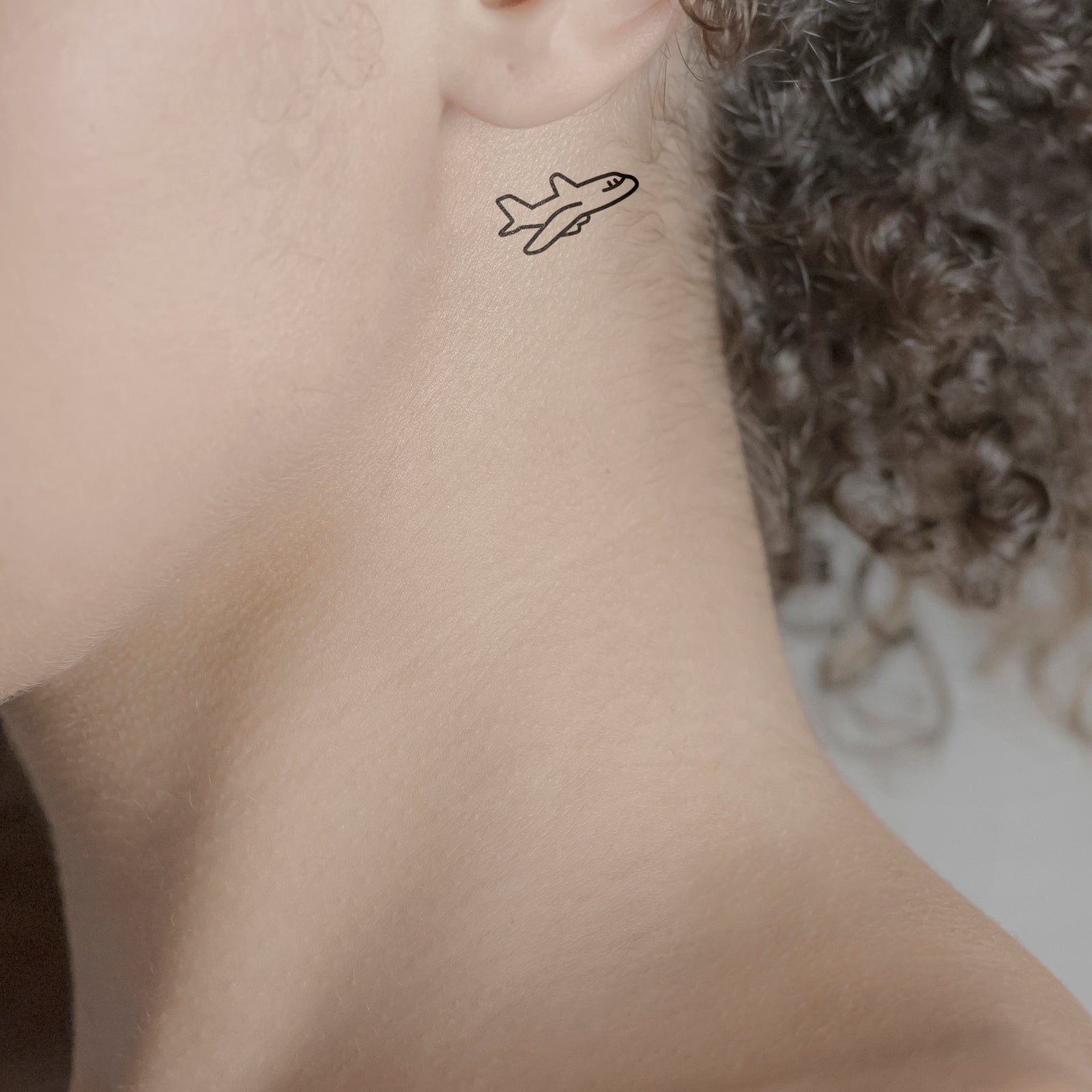 Temporäres Tattoo von minink: Niedliches Flugzeug