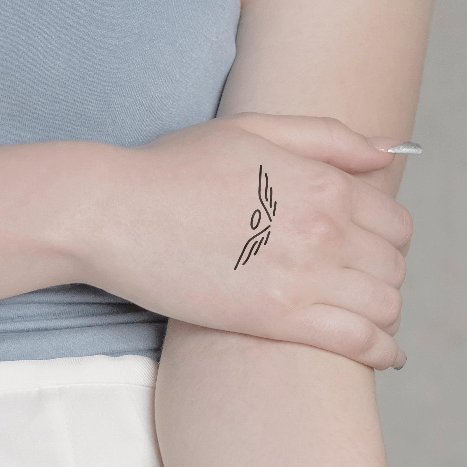 Temporäres Tattoo von minink: Engel mit Heiligenschein