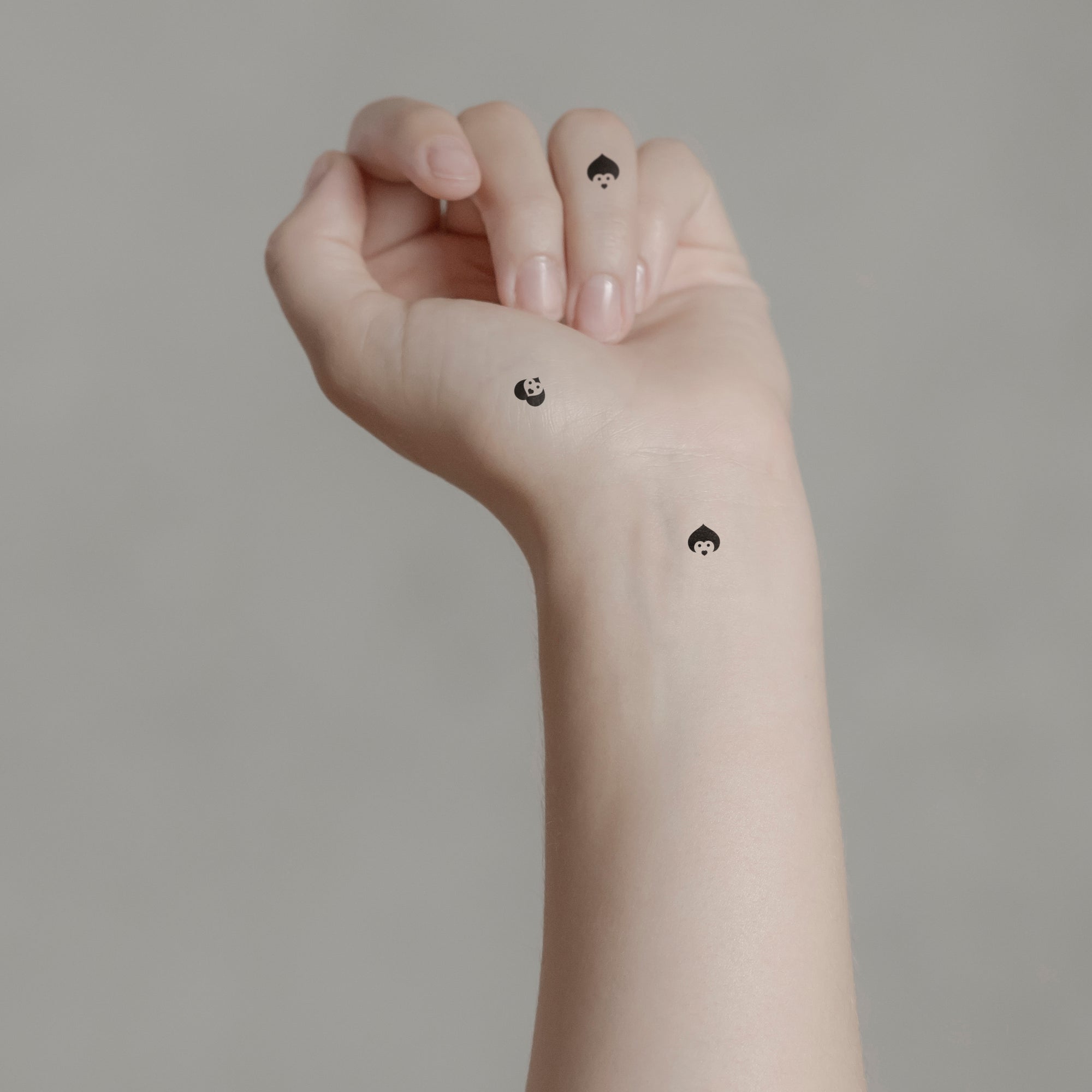 Temporäres Tattoo von minink: Herzen mit Gesichtern