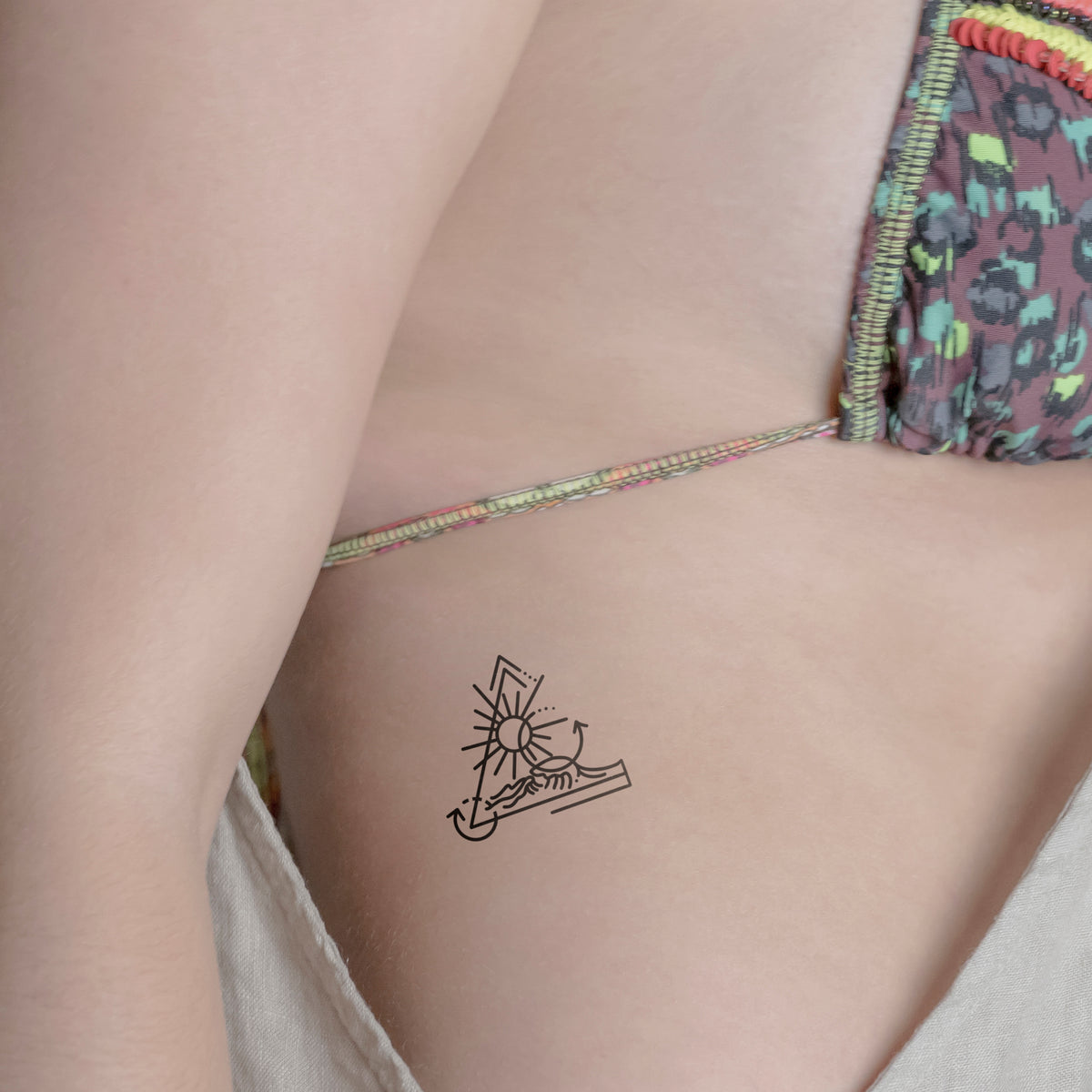 Temporäres Tattoo von minink: Mystische Sonne im Dreieck