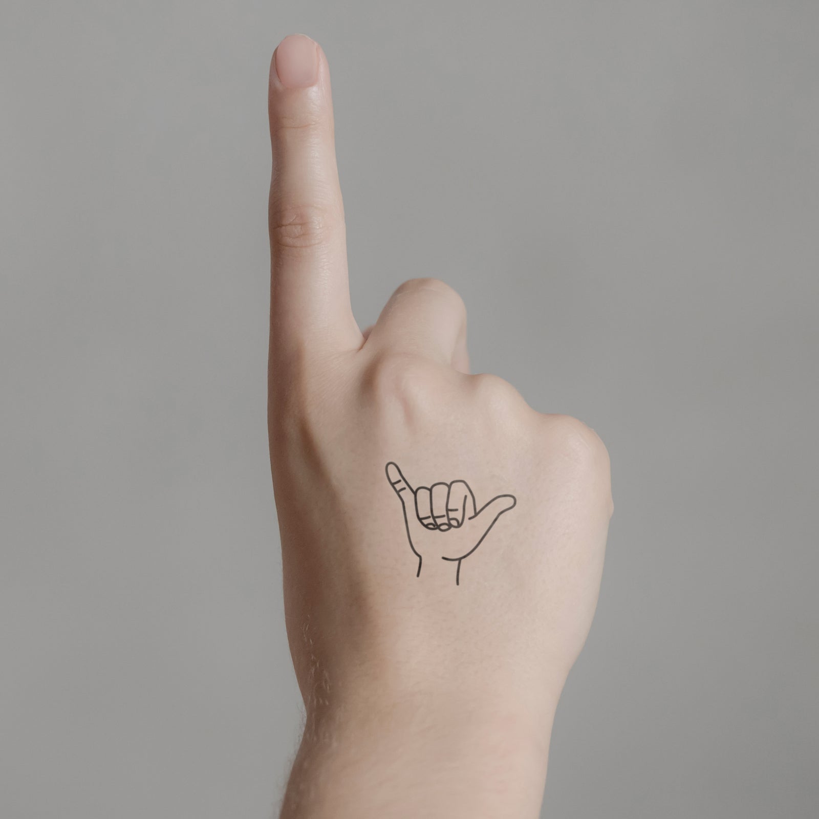 Hang Loose (Shaka) Tattoo von minink, der Marke für temporäre Tattoos.