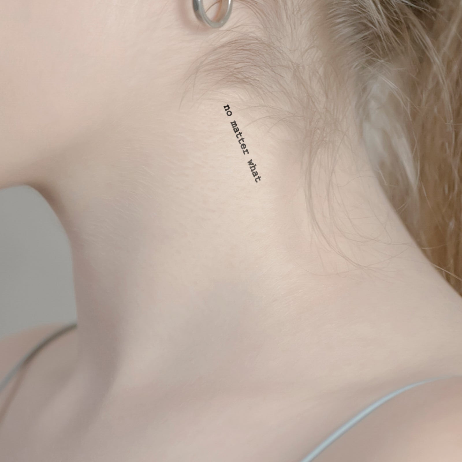 Schriftzug Tattoo no matter what von minink, der Marke für temporäre Tattoos.