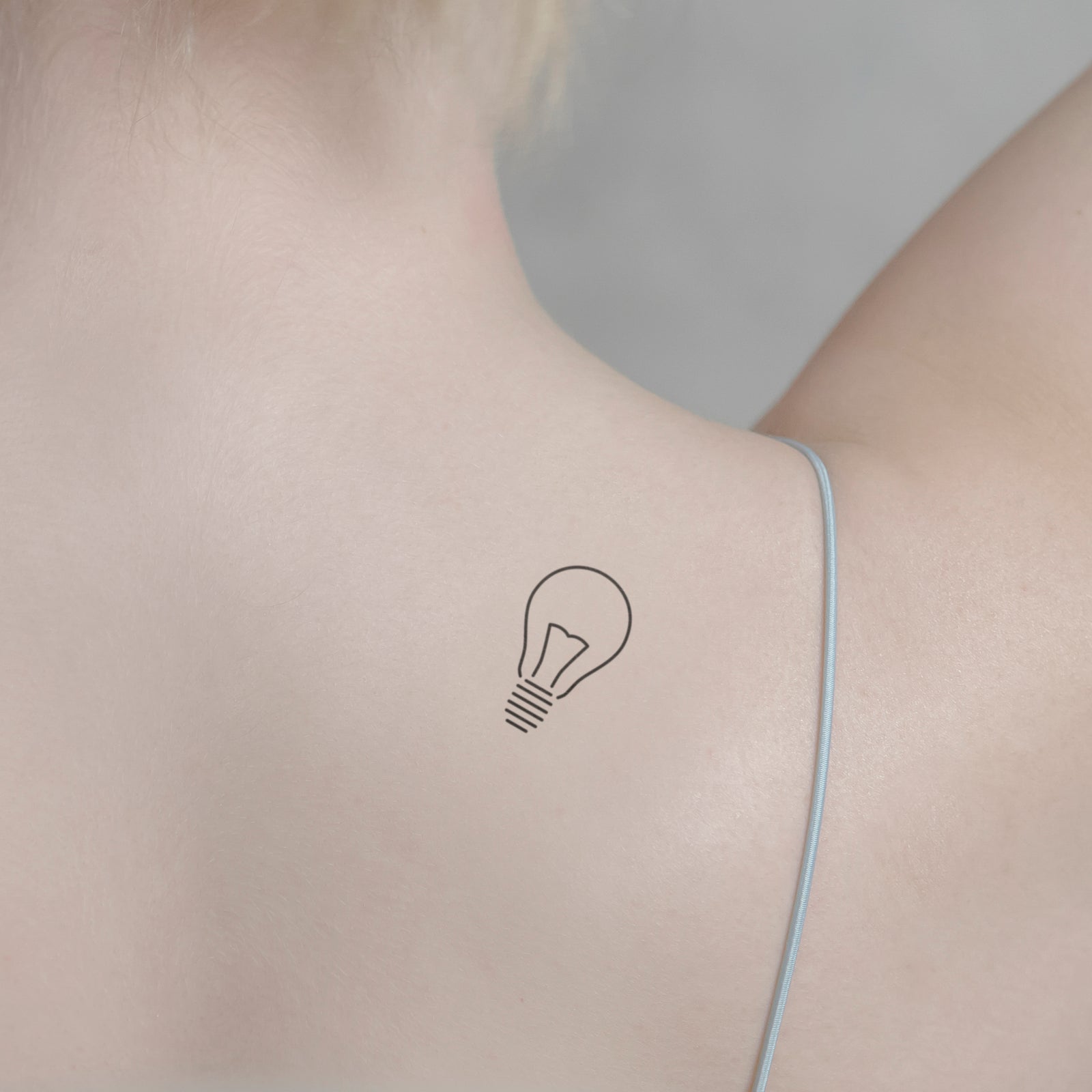 Glühbirne Tattoo von minink, der Marke für temporäre Tattoos.