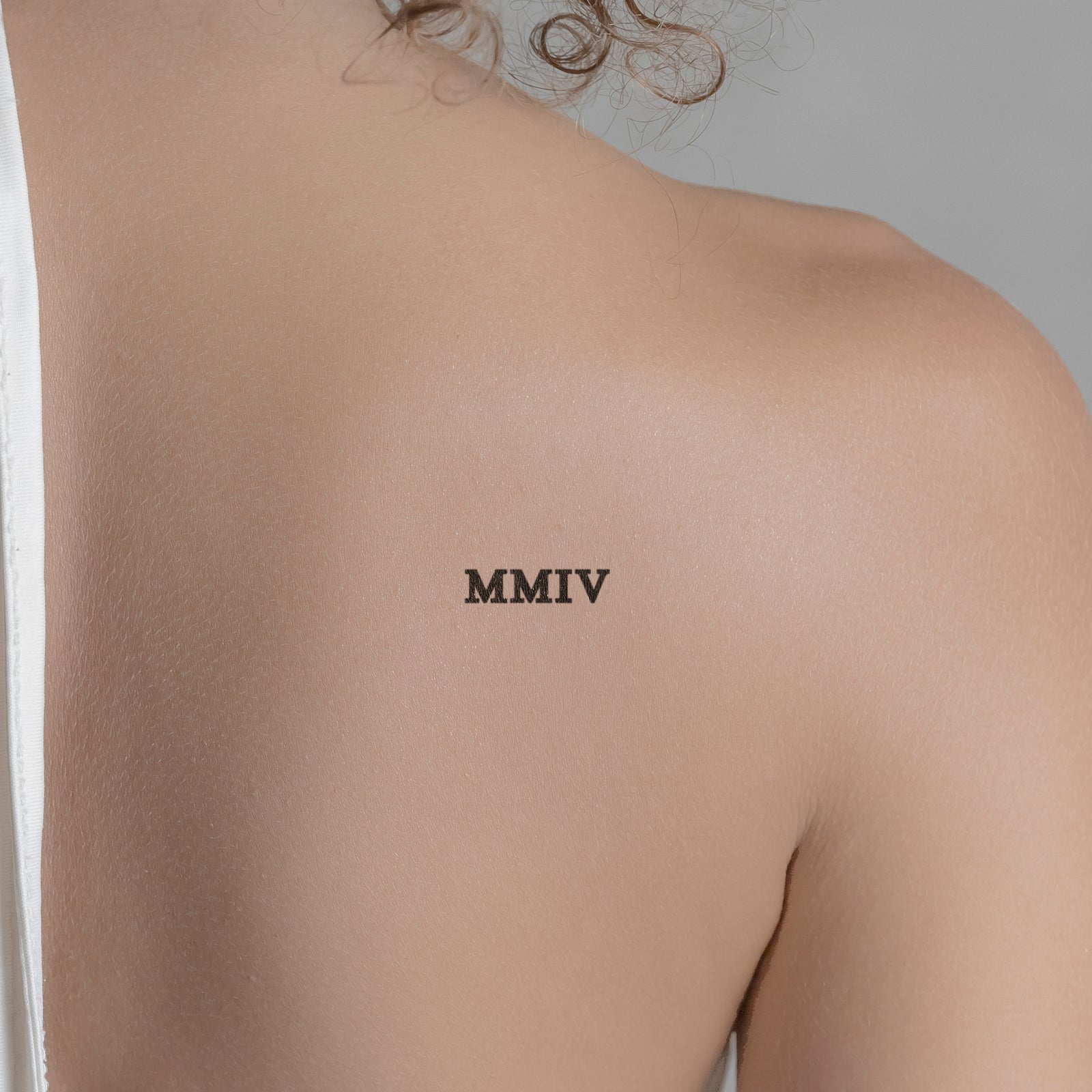 2002 in Roman Numerals Tattoo Meaning
