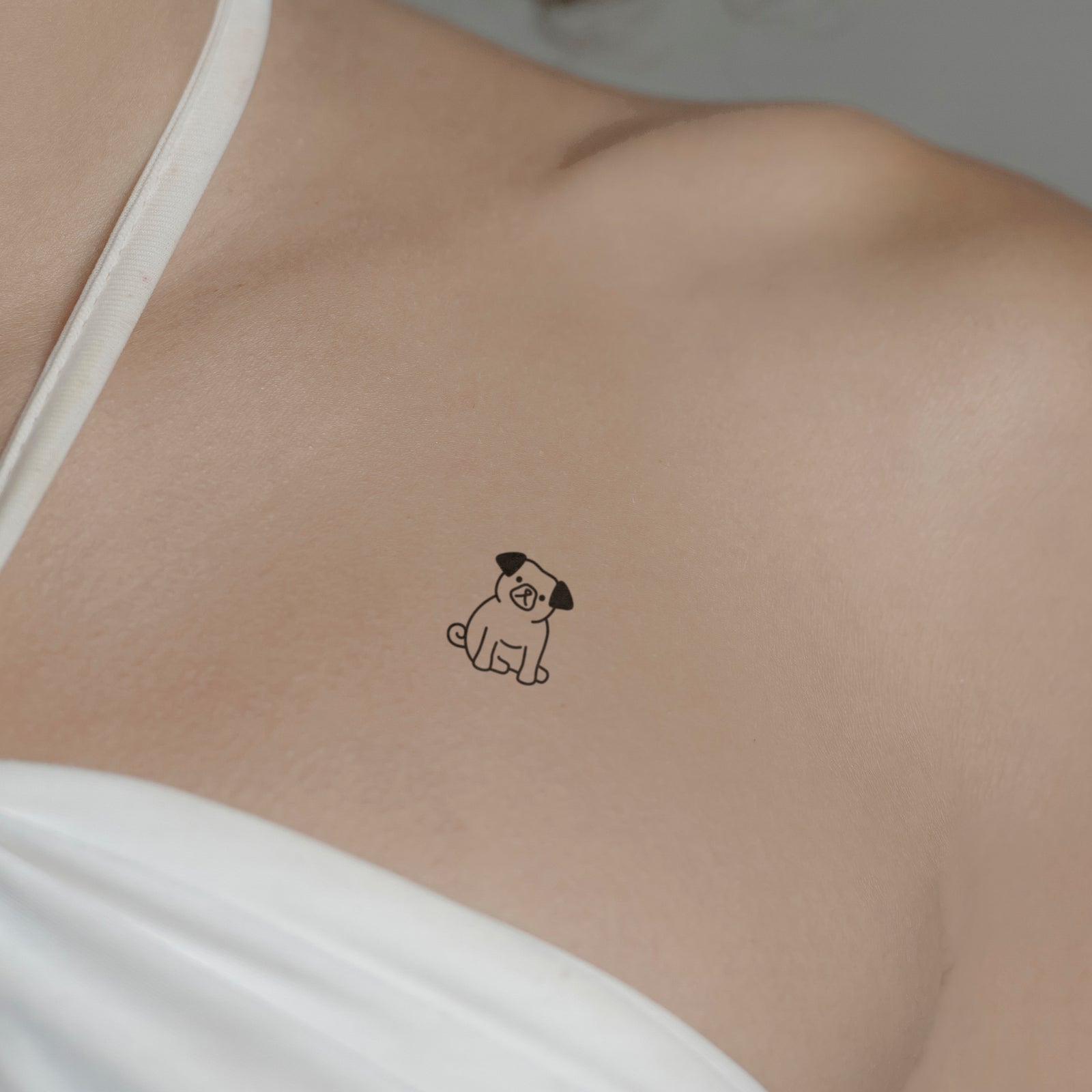 Hund Tattoo von minink, der Marke für temporäre Tattoos.