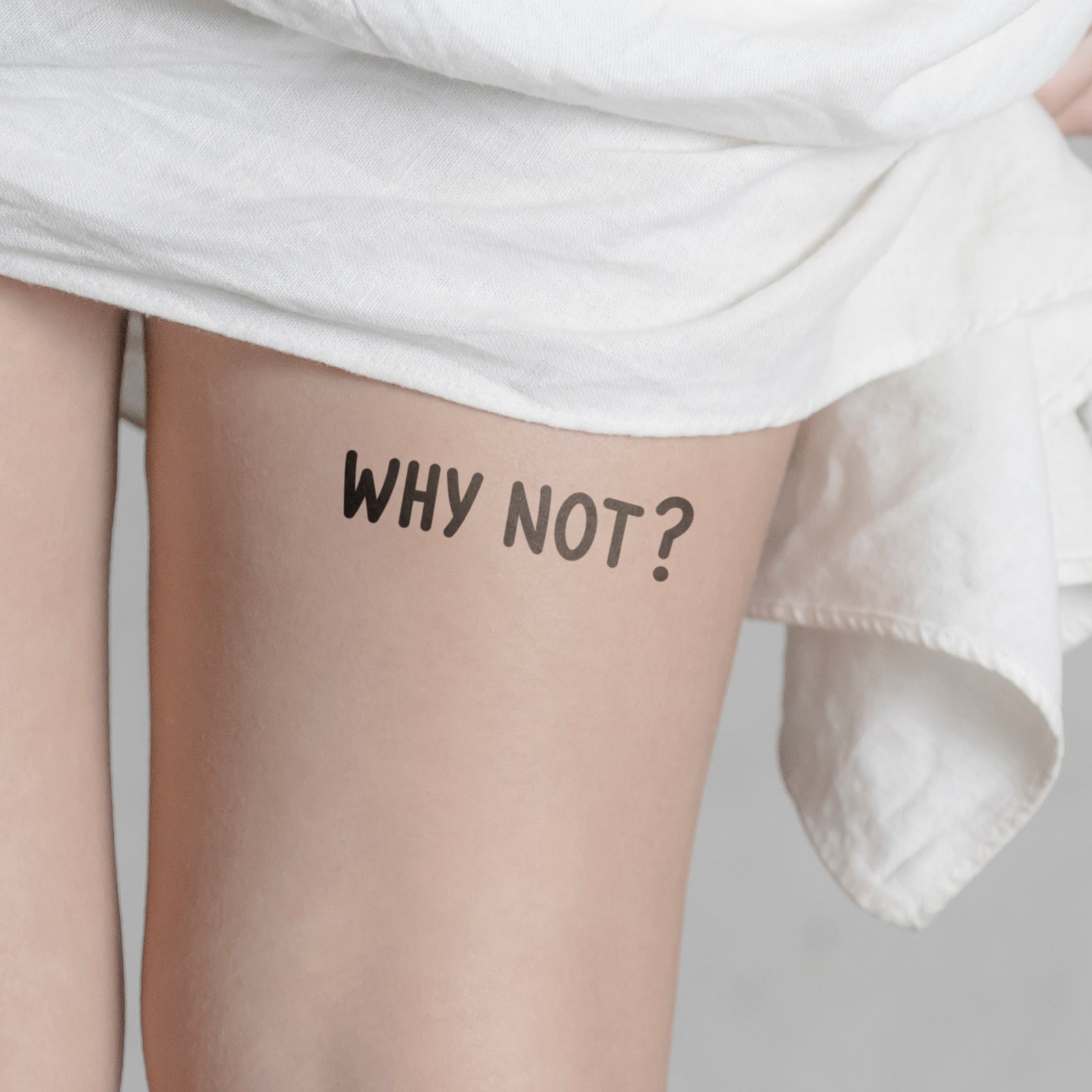 Schriftzug Tattoo WHY NOT von minink, der Marke für temporäre Tattoos.