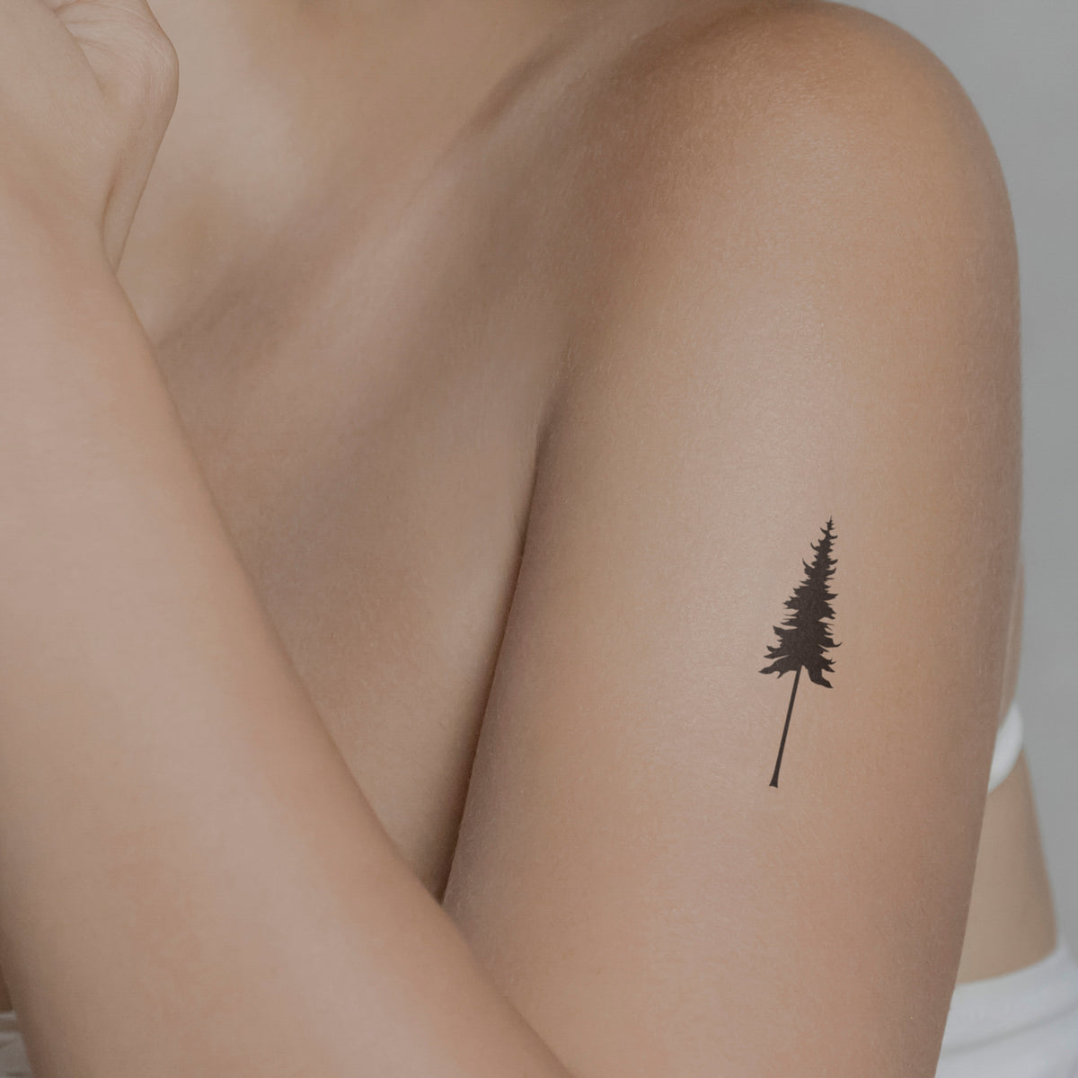 Nikin Baum Tattoo von minink, der Marke für temporäre Tattoos.